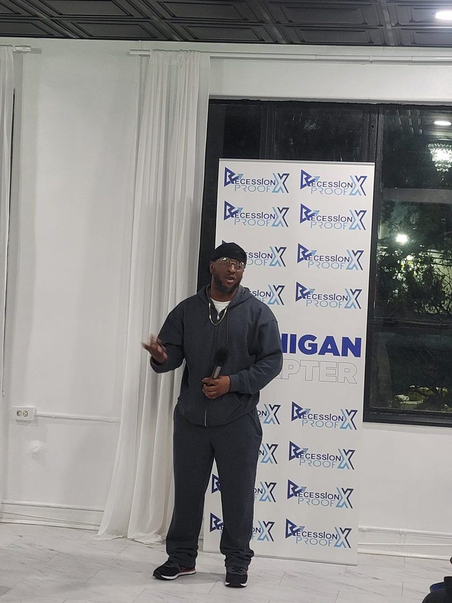A member speaking to the room at a Recession Proof Michigan event.